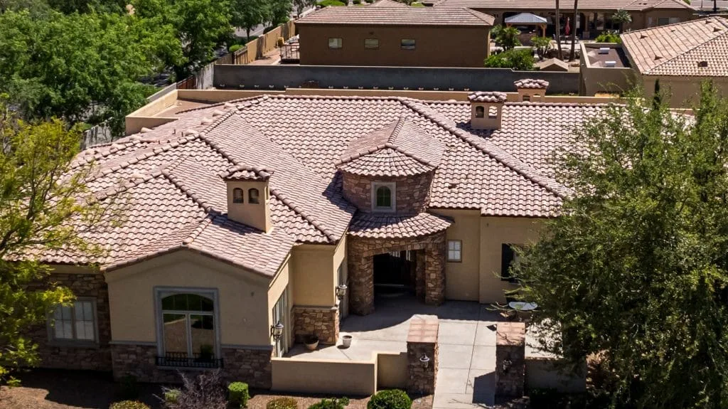 Aerial view of a residential tile roof inspected by AZ Shingle Pros in Phoenix